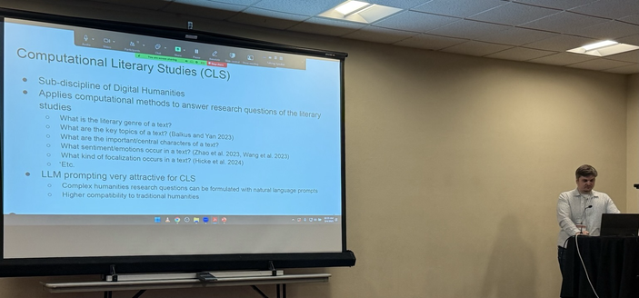 Janis Pagel on the right side of the picture introduces Computational Literary Studies to the workshop audience at SIGHUM NAACL2025. Slides with explanation of CLS