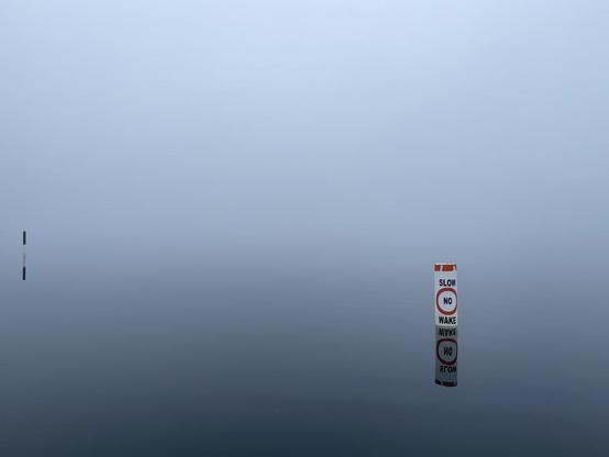 Still lake in gray.