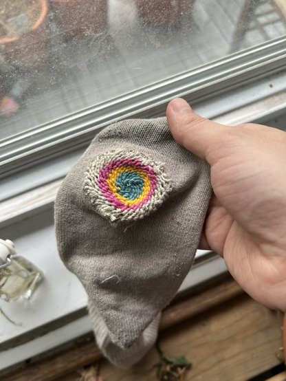 The same sock, off the darning egg, looking somewhat unsettling