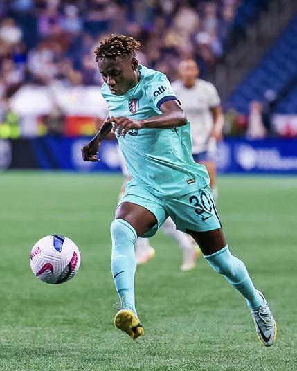 Action photo of Lacho on the ball