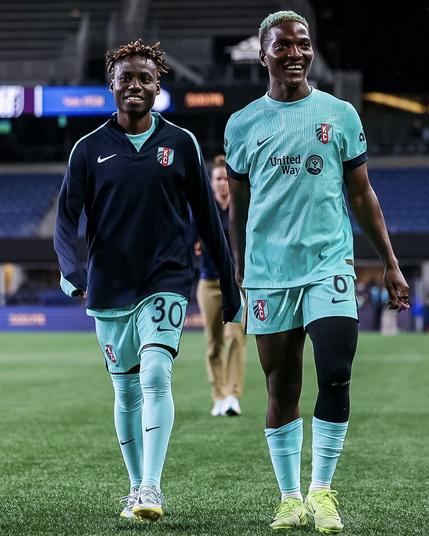 Lacho and Chawinga walking together post match