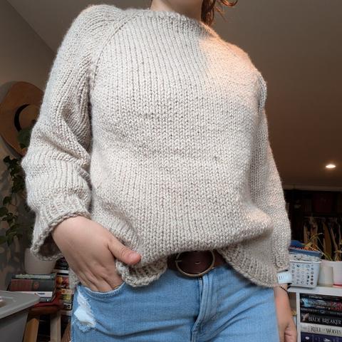 I'm modeling a recently finished beige raglan sweater (front view)