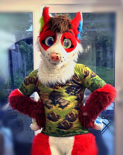 Fox fullsuiter standing in front of the garden wearing an Age Of Empires 2