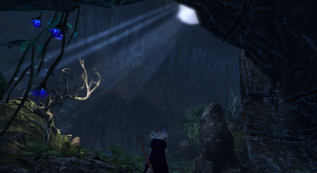A screenshot from Second Life's Fantasy Faire, 2025. The back of an anthropomorphic mouse, wearing a flower tucked behind her ear and a rich purple cloak, her tail held up, takes in a beautiful subterranean scene. Light enters the cave from above, illuminating an antler-like tree on a mossy stone.

Fungi, vegetation, vines, and bright, glowing blue flowers fill the cave, and in the distance, a lit opening in the cave hints at some man-made construction beyond.