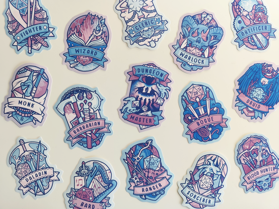 photo of my many stickers of dnd class designs