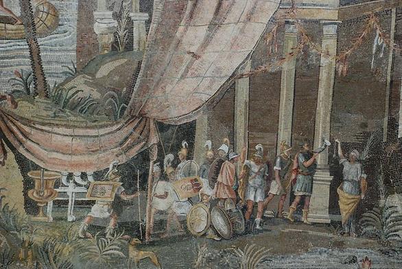 This scene is part of the Nile mosaic of Palestrina (c. 100 BCE), found in Palestrina, Italy. It portrays a group of Ptolemaic Greek soldiers in Egypt on the banks of the Nile. The soldiers are clad in typical Hellenistic equipment including Phrygian and Attic type helmets, tunics or armour made of linen (linothorax in Greek), and various shield designs common to Hellenistic armies at the time. Similar Nilotic settings were popular in Republican and Imperial Roman art as a result of the Roman fascination with Egypt's exotic culture. (National Archaeological Museum of Praeneste, Palestrina, Italy). Image credit to Camelia.boban.