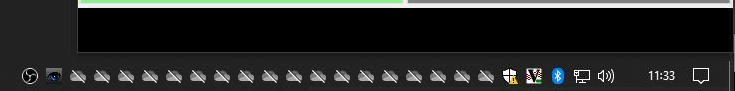 A screenshot of the system tray on Windows showing 18 OneDrive icons.