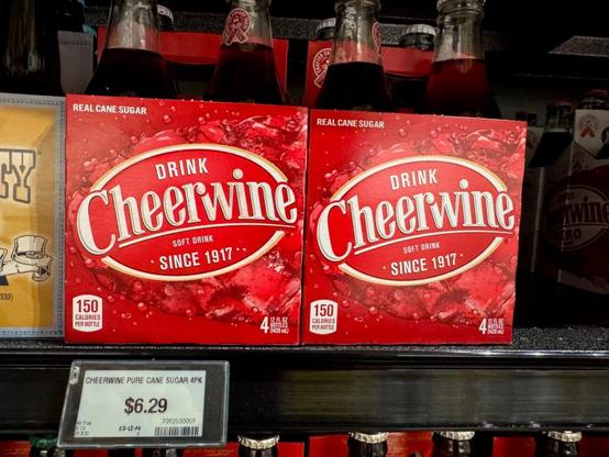 grocery store price display for the Salisbury, North Carolina classic cherry flavored soft drink Cheerwine