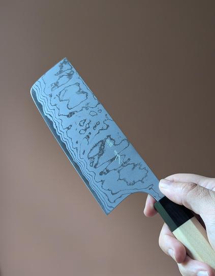 A Masakage Shimo Nakiri knife in my hand.