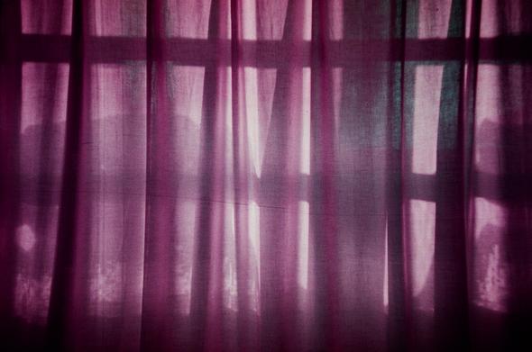 A purple effect on white curtains
