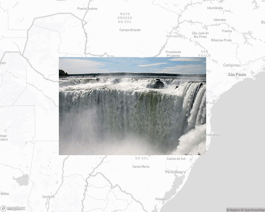 A photo of or from a national park from the linked website, overlaid on a cropped world map where it's located.