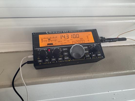 Picture of a KX2 sitting on a windowsill.
