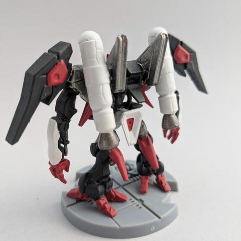 The back of a painted Gundam Artifact Byarlant Custom. It is painted in red, black, gunmetal, and white.