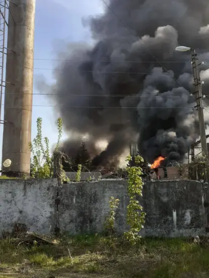 Smoke rises over the site of a reported attack at the Strela electromechanical plant in Russia's Bryansk Oblast, on May 4, 2025