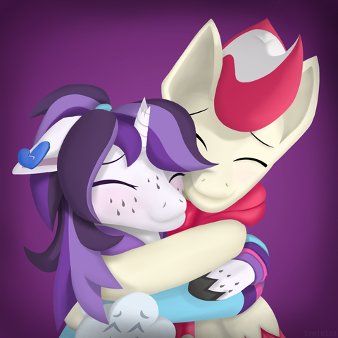 2 ponies hugging eachother
