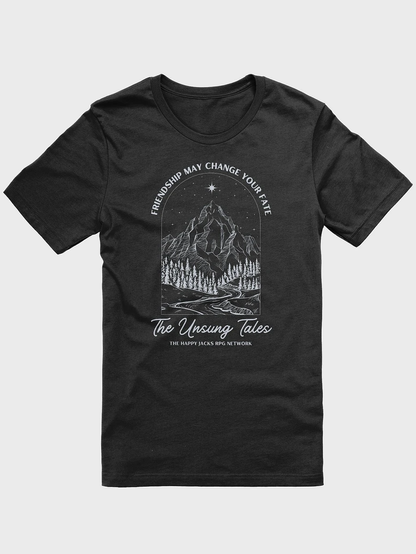 A black tee with an outline of a mountain with a star above it. The words "Freidnship may change your fate" lie overtop of it. And the words "Unsung tales" are below it.