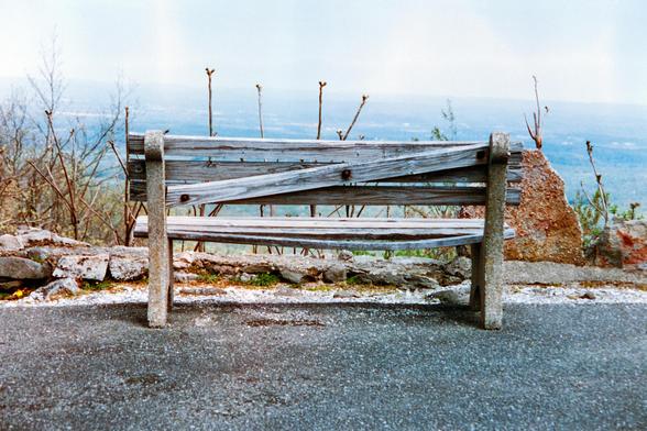 A weathered wooden bench