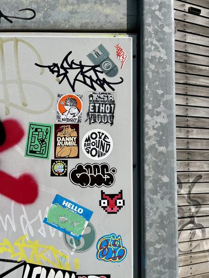 Many stickers on wall