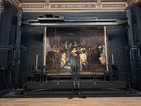 Rembrandt’s “The Night Watch”. This is behind glass. Renovations are taking place to replace the varnish.