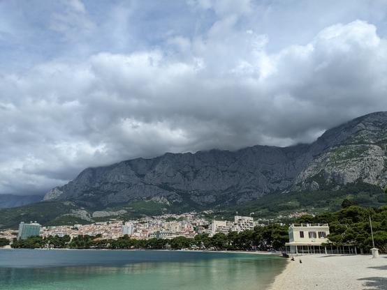 Dalmatian steep mountain coast with gorgeous historic town foreshore