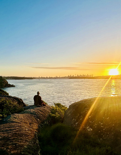 Bhante Jāgaro enjoying the sunset over the bay just outside of Sydney.