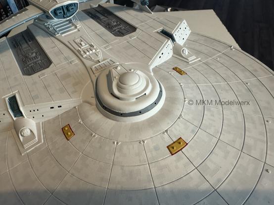 Top of the saucer section showing the painted phaser banks.
