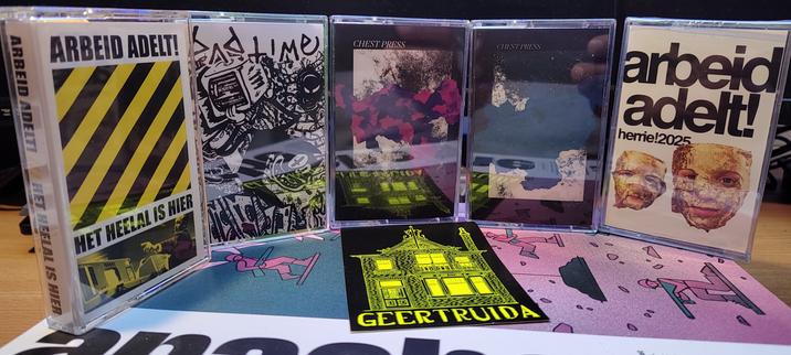 Five cassette tapes in a row, contains music from Arbeid Adelt, Badtime and Chestpress.