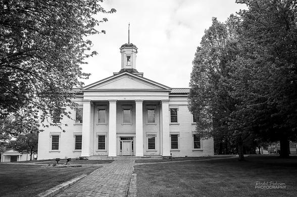 A view of the south face of the old Illinois statehouse in Vandalia, Illinois.  It's a two-story brick structure painted white.