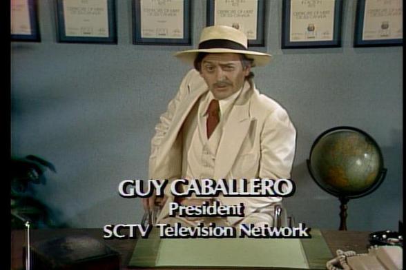 The late Joe Flaherty as SCTV President Guy Caballero. He uses the wheelchair "for respect," you know