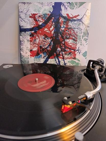 Photo of a turntable playing Widow's Weeds by Silversun Pickups.