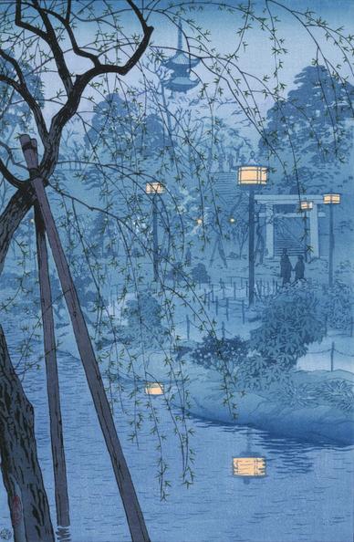 The 'blue hour' of the evening descends on Ueno Park, in Tokyo. In the foreground, a tall willow tree is supported from below by a simple wooden A-frame prop; green new leaves of spring have begun to appear on the slender branches. Beyond, lanterns are already lit for the evening. Further on, a pair of figures approaches a torii gate marking the path to the five-story pagoda of Kaneji Temple. The image is an 'aizuri-e' print, rendered almost entirely in shades of blue.