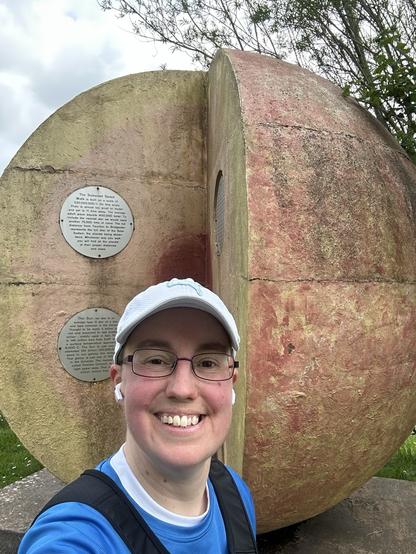Selfie of Emily standing in front of the sun.
