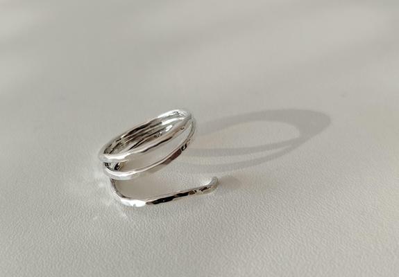 a double banded silver ring with hammered and glossy effects