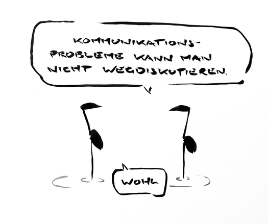 Cartoon aus wenigen schwarzen Tuschestrichen. Zwei Kraniche stehen im Wasser. Einer sagt: „Kommunikationsprobleme kann man nicht wegdiskutieren.“ der andere: „Wohl.“