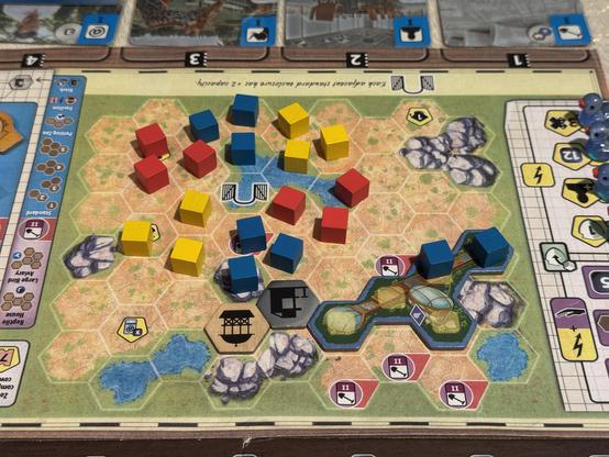 Ark Nova map "Outdoor areas" with lots of blocks in different colors to plan out the buildings.