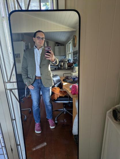 Mirror selfie of me wearing the outfit shown in the flat lay