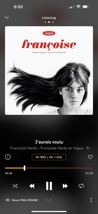 A screenshot of the Qobuz iOS app streaming a Hi-Res audio file to a Denon integrated amplifier.