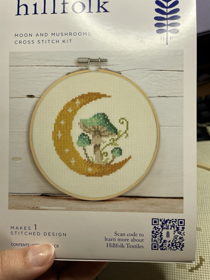A picture of the box depicting three mushrooms and a crescent moon shape that is what my final product should look like once finished.