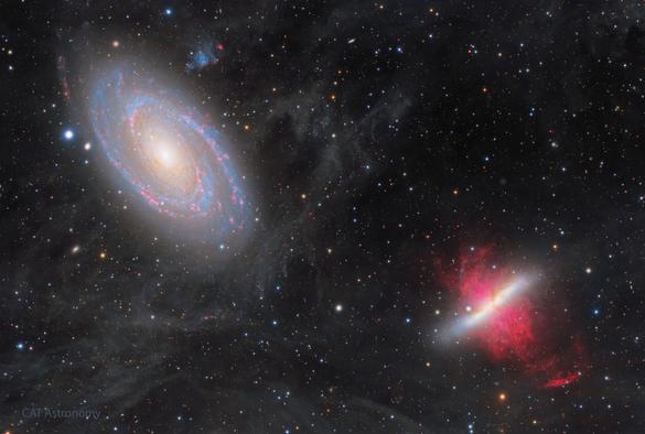 Portrait of elliptical and neighbouring irregular galaxies.