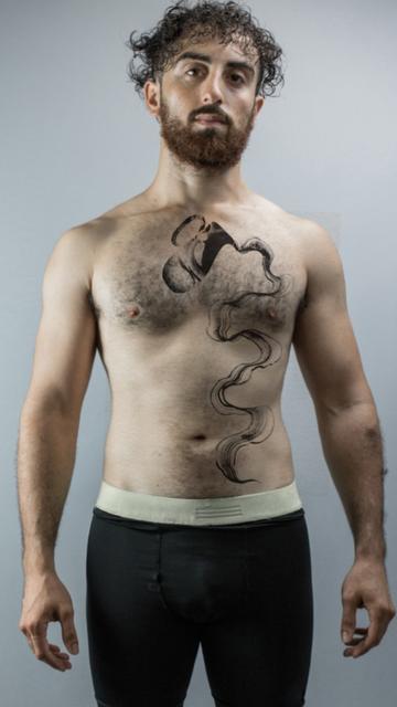 Mockup of said tattoo design on a chest