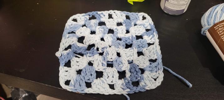 Another granny square, this time more neat looking. This time the piece is made with cotton yarn that has a faded denim colorway.