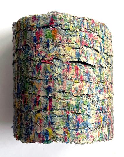 Shredded an compressed pile of bank notes.
