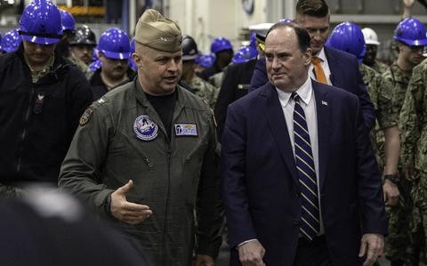 Navy secretary presses shipbuilding, sailor welfare during first overseas trip