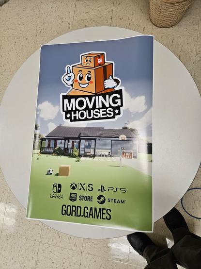 Moving Houses poster showing game logo, house background, and a collection of game system logos including Nintendo Switch, Xbox, PlayStation 5, Epic Games Store, and Steam.  Finally has gord.games website address.