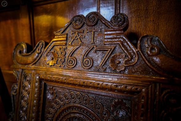 Ornate wooden medieval chair back