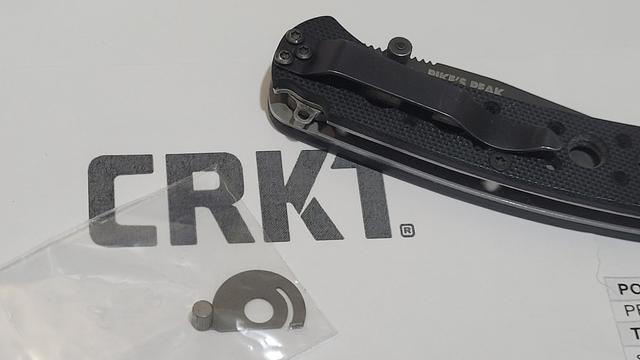 CRKT logo with spare part