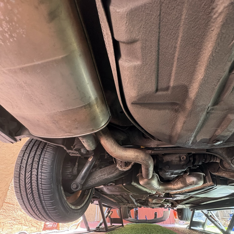A view underneath my 2003 BMW 530iT, where I have finished installing the exhaust.
