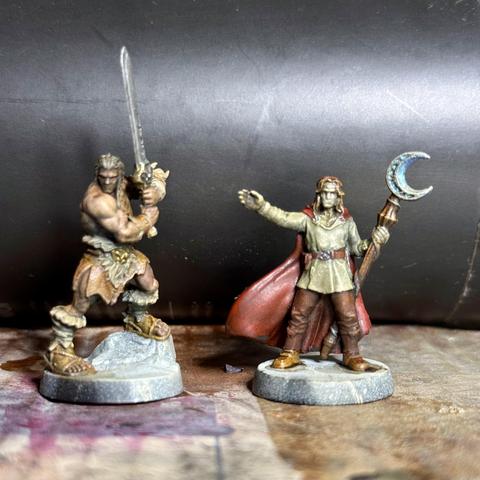 Painted minis from the HeroQuest board game – barbarian and wizard