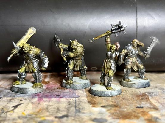 Painted minis from the HeroQuest board game – a selection of orcs with various weapons