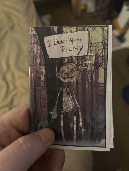 The cover of a 8 page zine. It is Pinocchio saying “I don’t want to obey”